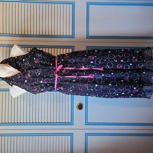 Scarlett Black Sleeveless Dress with Pink Ribbon